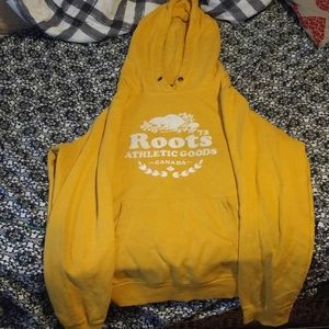 I am selling a mustered yellow Roots hoodie